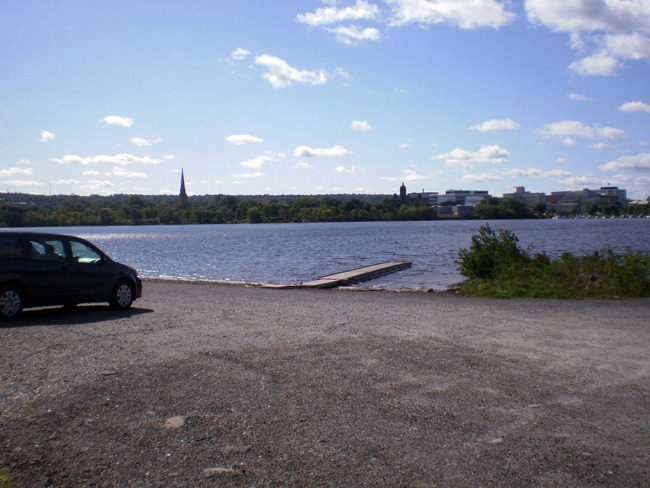 Boat Launch area, River, and a bit of Downtown Fredericton in the distance.